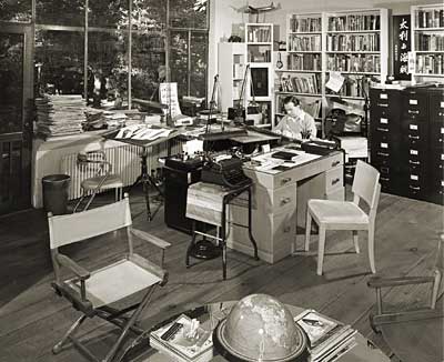 Milton Caniff in his studio